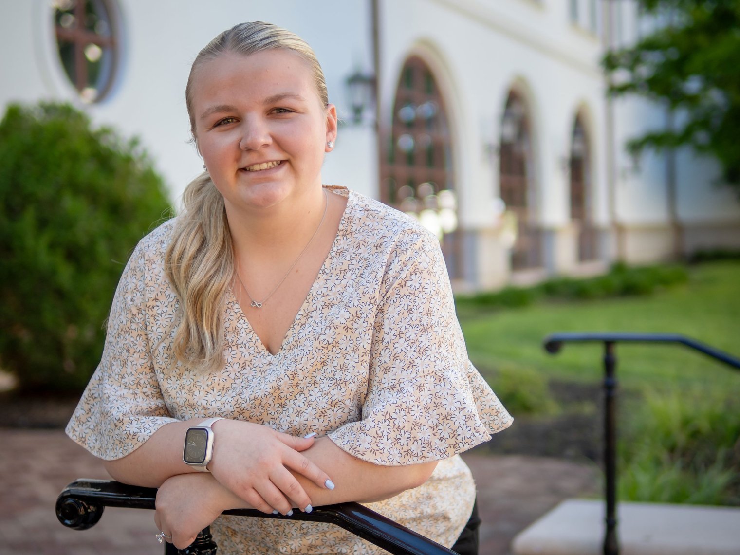 Madison “Maddie” Heinold, who will be teaching second grade, holds her favorite children’s books on the Montclair campus.