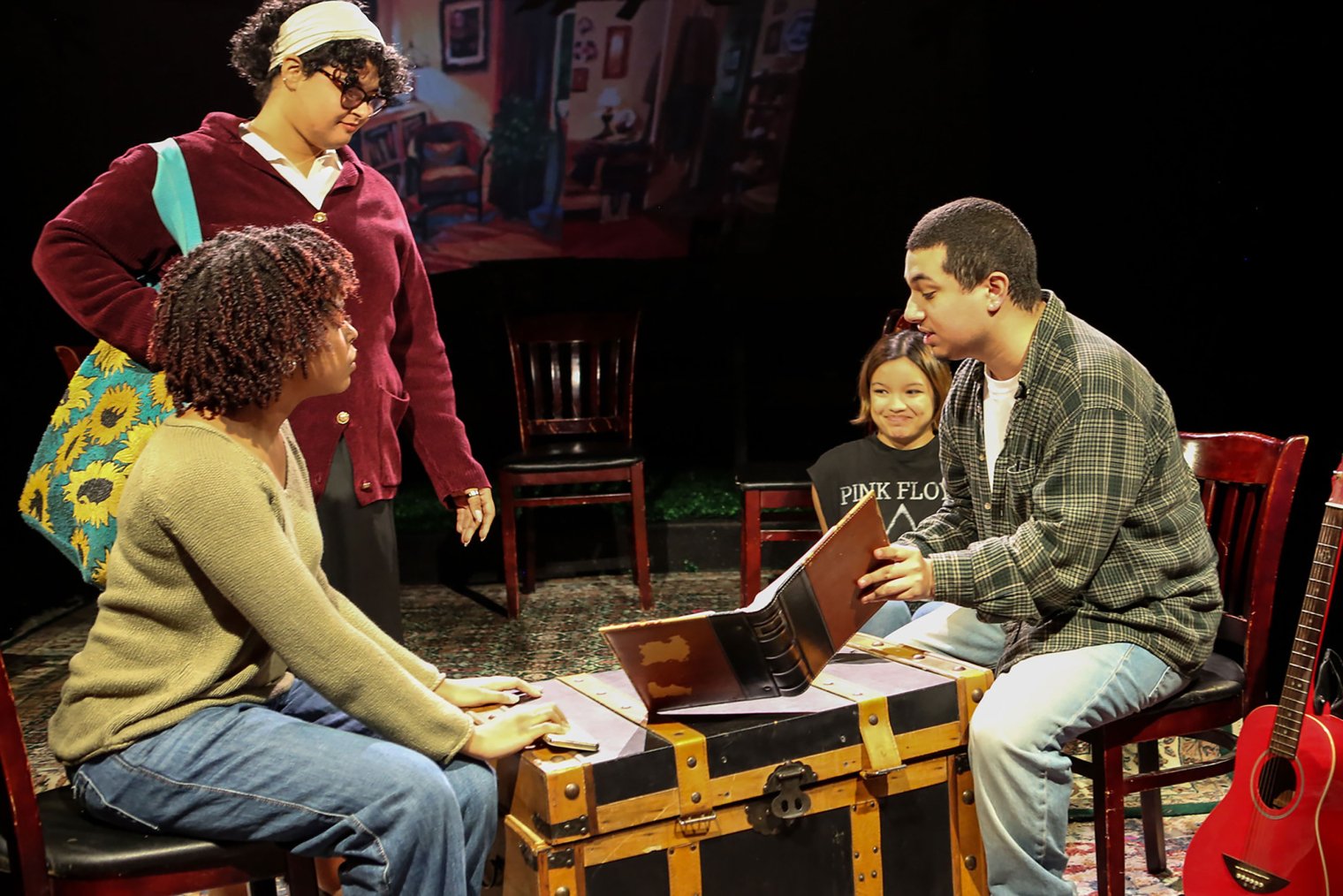 Four Montclair students perform The Quilt Keepers onstage.