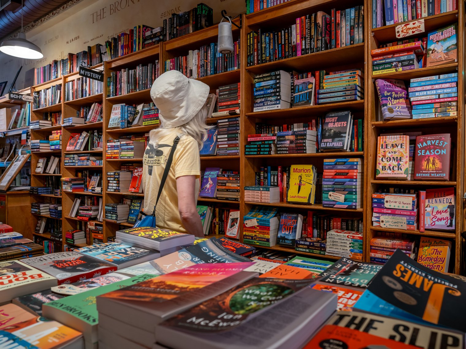 A woman looks at books at Watchung Booksellers.