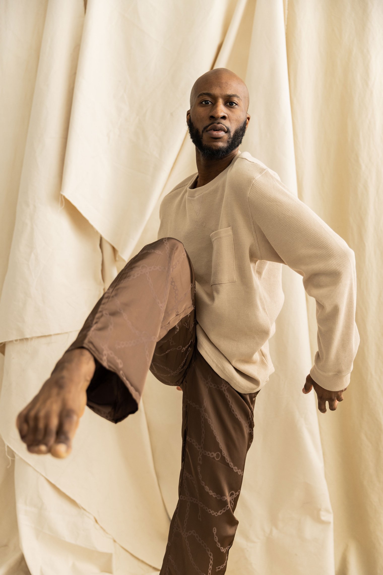 Malcolm McMichael holds a dance pose.