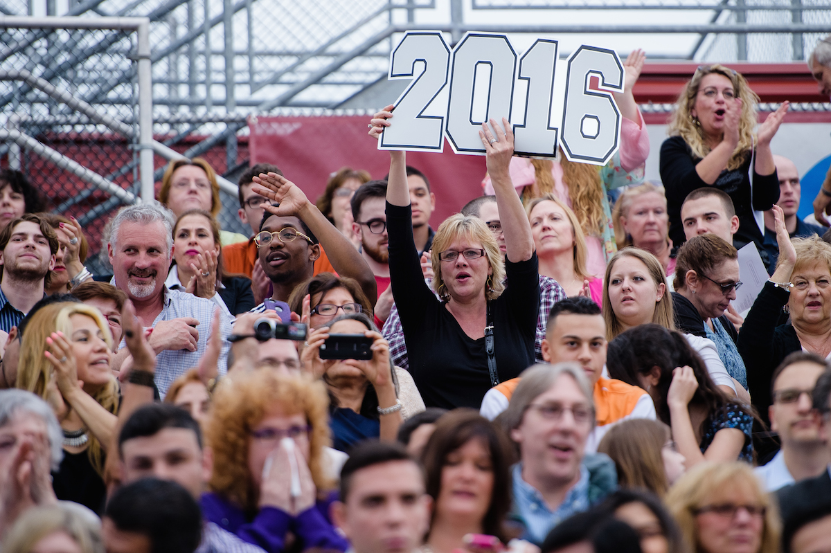 Celebrating family and friends cheer on the graduates at the 2016 College of the Arts Convocation.