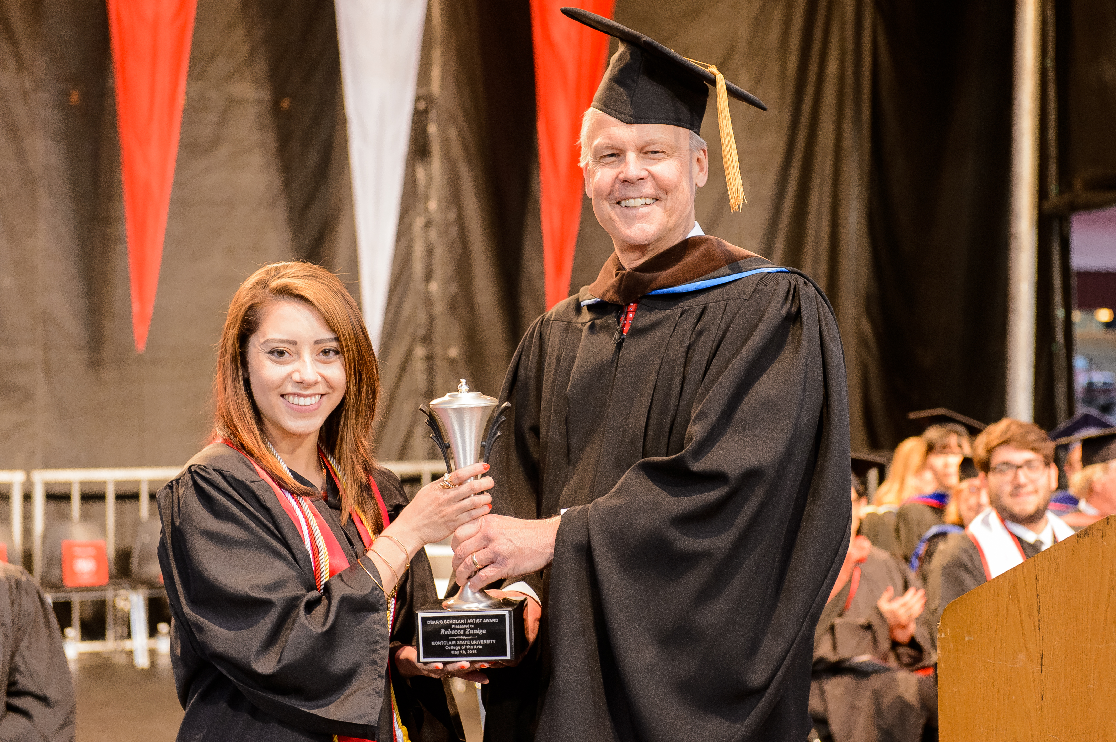 Dean's Scholar Award and Arts Education award winner Rebecca Zuniga and the College of the Arts Dean Daniel Gurskis.