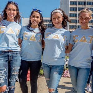 Photo of students wearing Sigma Delta Tau tee shirts.